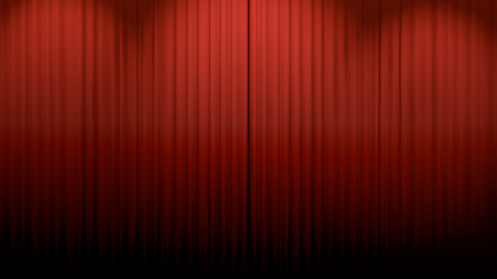 Закрытые красные театральные шторы.